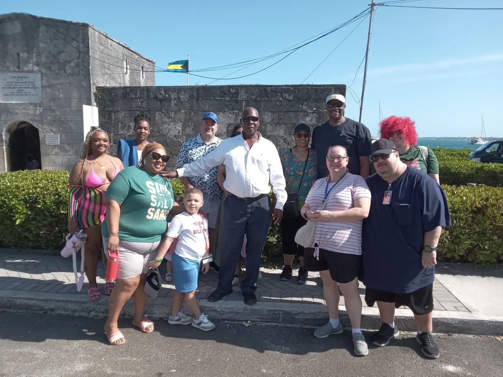Tour group visiting a Nassau fort
