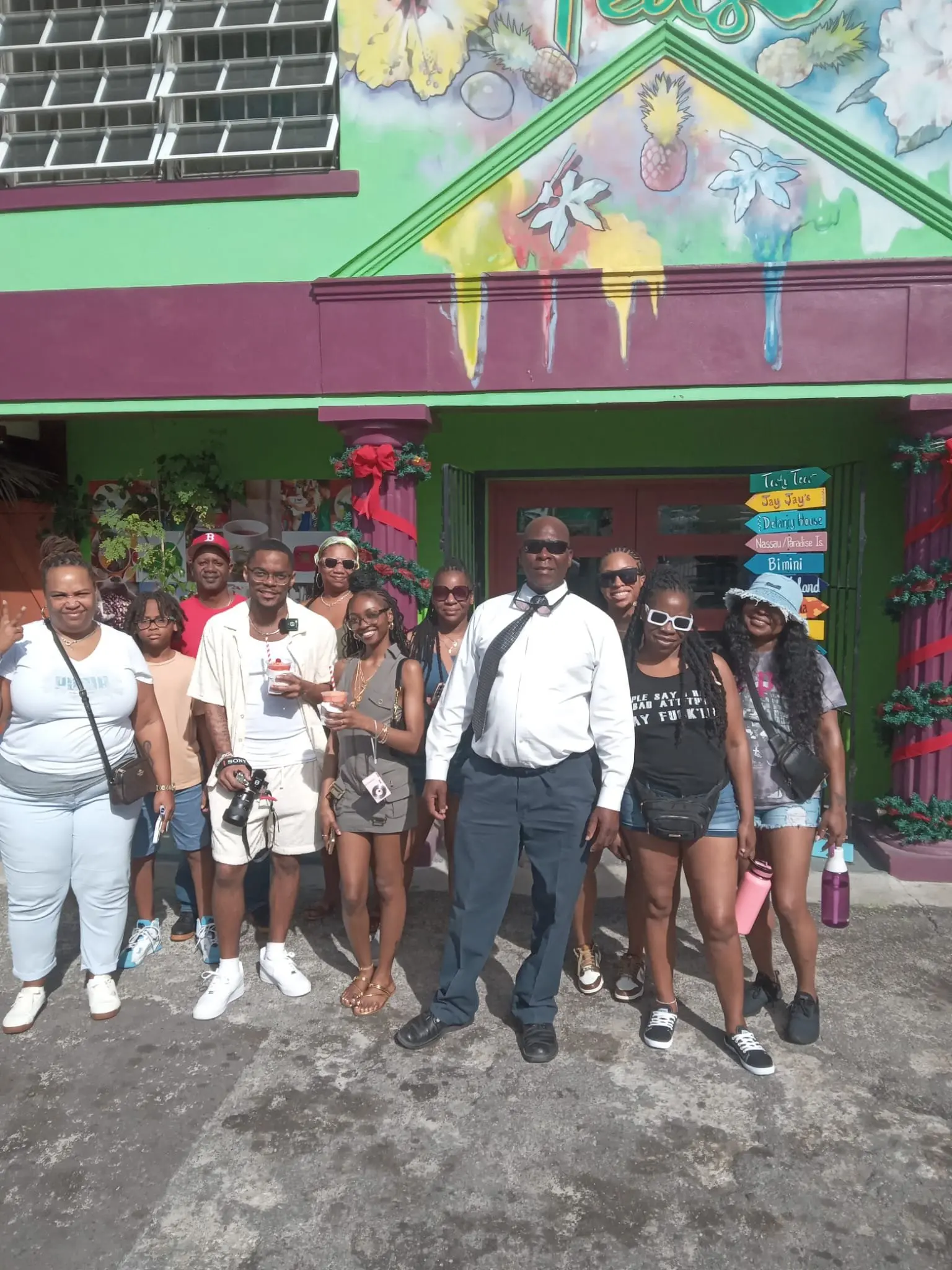 Sir Guillaume with guests at a local Nassau stop