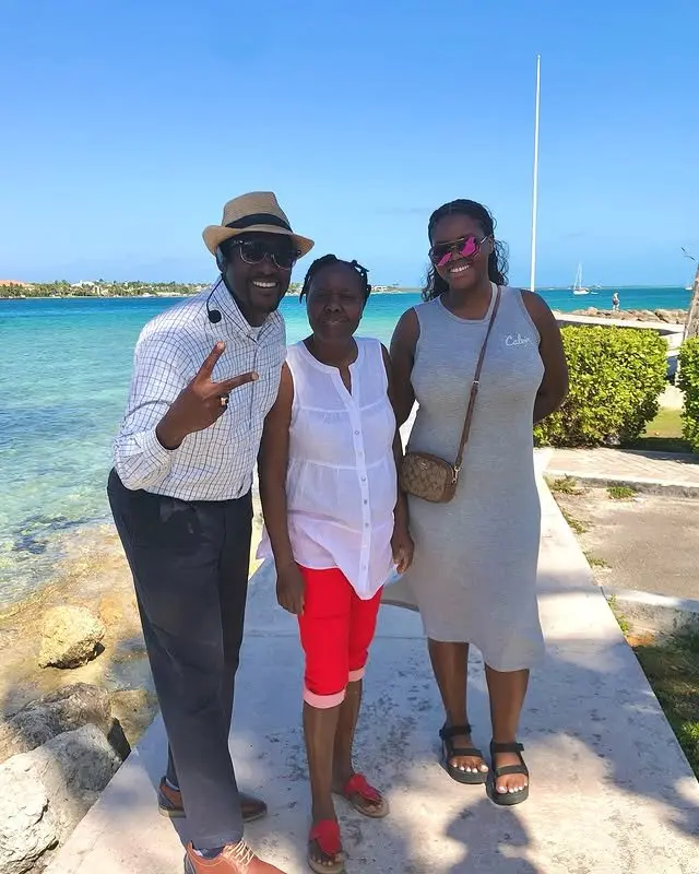 Sir Guillaume with guests at an ocean viewpoint